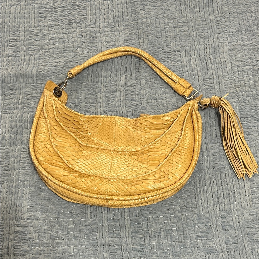 Chic Gold Hobo Bag with Tassel Accent